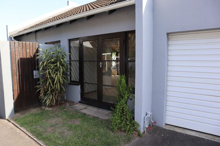 Townhouse for Sale in New Germany: 1.5 beds, patio, garage, courtyard access.