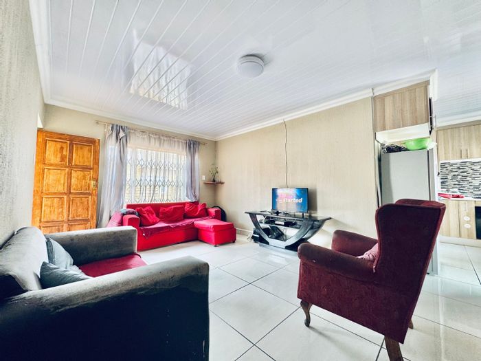 3-Bedroom Townhouse in Penina Park For Sale with Garage and Outdoor Spaces.