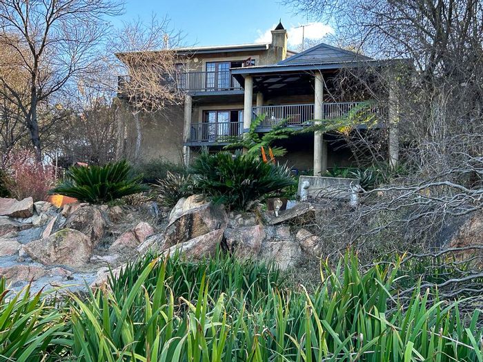 Riverfront small holding in Potchefstroom Rural, featuring pool, bar, and guest house potential. For Sale.