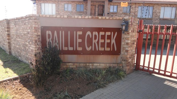 Two-Bedroom Townhouse in Baillie Park - For Sale with Secure Parking and Amenities