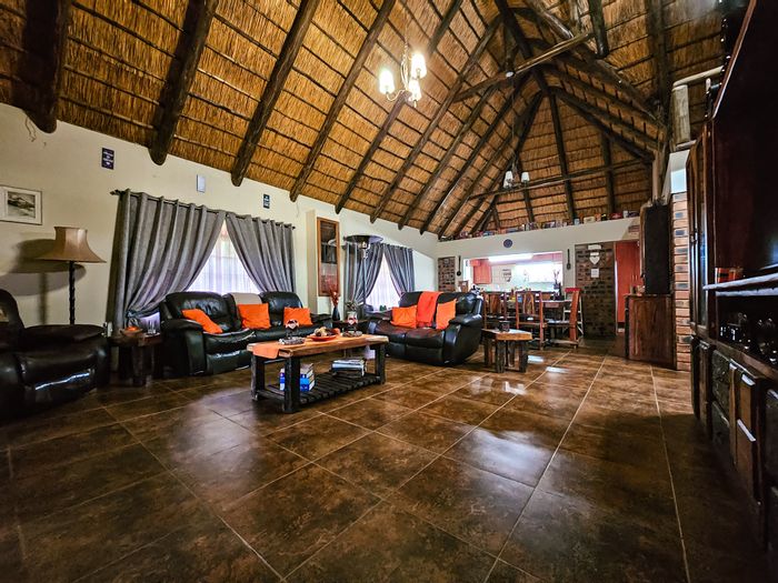 For Sale: 143 Ha farm in Mookgopong Central with solar power, multiple chalets, and amenities.