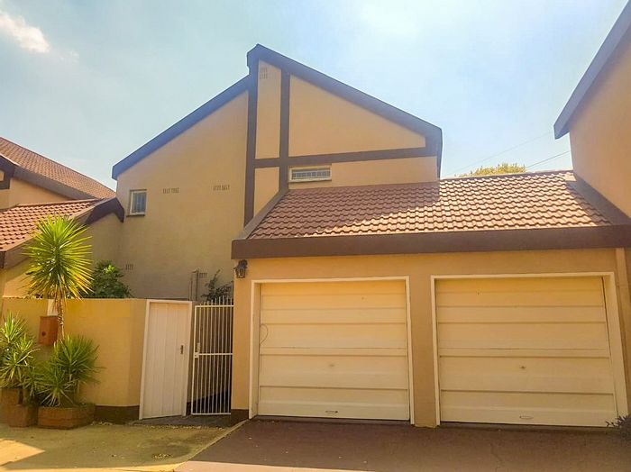 Townhouse for sale in Potchefstroom Central with private garden and secure parking.