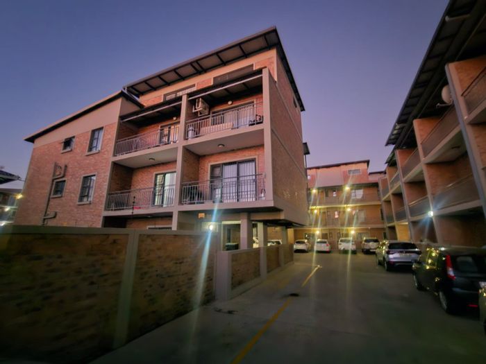 For Sale: Apartment in Die Bult with 2 en suite bedrooms, balcony, secure parking.