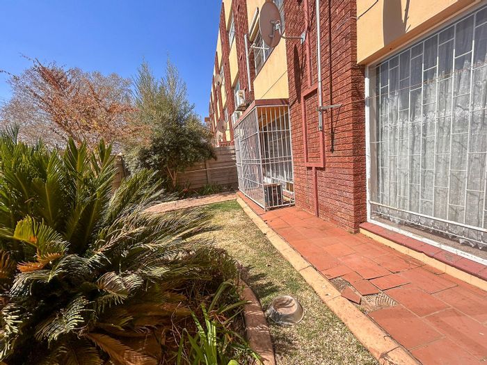 Spacious 2-bedroom apartment with private garden in Potchefstroom Central, For Sale.
