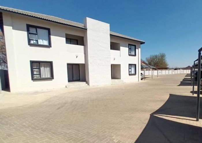 For Sale: 2-Bedroom Townhouse in Grimbeeck Park with secure parking and open-plan living.