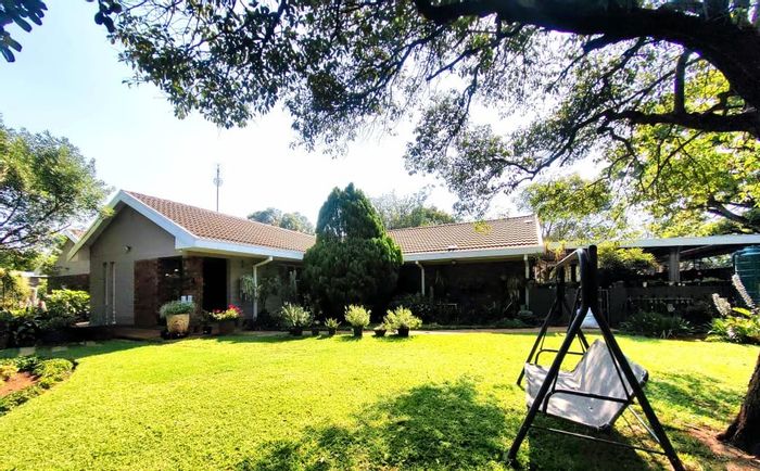 For Sale: House in Potchefstroom Central with 4 bedrooms, study, and spacious yard.