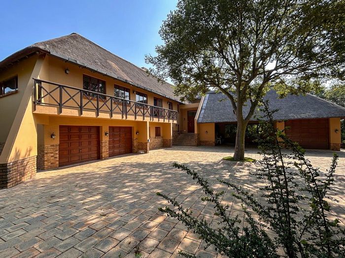 Boschenvaal River Front Lodges House For Sale: 4 beds, pool, boat garage, serene views.