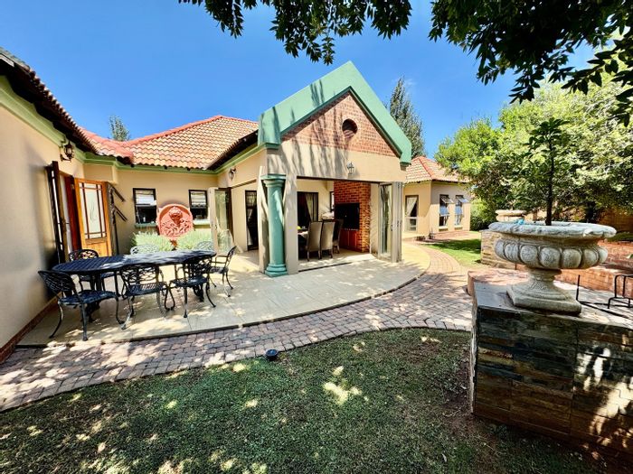 For Sale: House in Tuscany Ridge with 4 beds, patio, playroom, and garage.