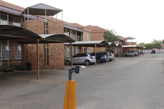 For Sale: Apartment in Dassie Rand with open-plan layout, secure complex, and parking.