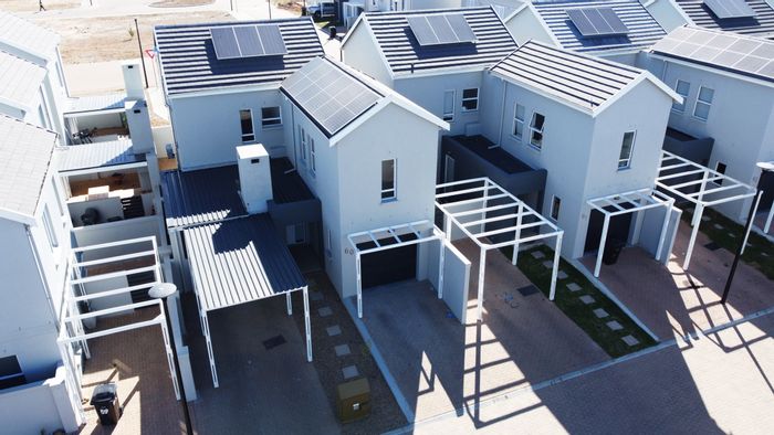 3-Bedroom Townhouse For Sale in Klein Parys with garage, braai area, and secure estate.