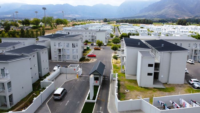 1-Bedroom Apartment For Sale in Klein Parys with secure estate and communal braai area.