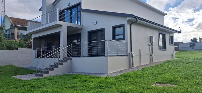 Wavecrest House For Sale: Ocean views, en-suite bedrooms, double garage, entertainment area.