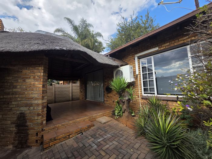 For Sale: Townhouse in Safari Gardens with 3 bedrooms, patio, and converted garage.