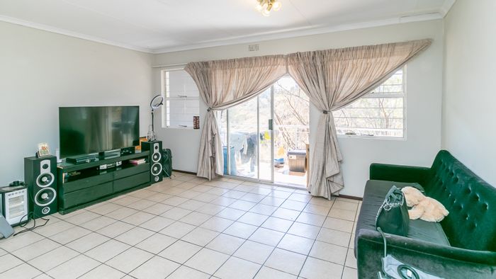 2-Bedroom Apartment For Sale in Ferndale with open living area and ample storage.