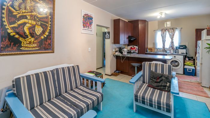For Sale: 2 Bed, 2 Bath Apartment in North Riding with Covered Patio and Parking.