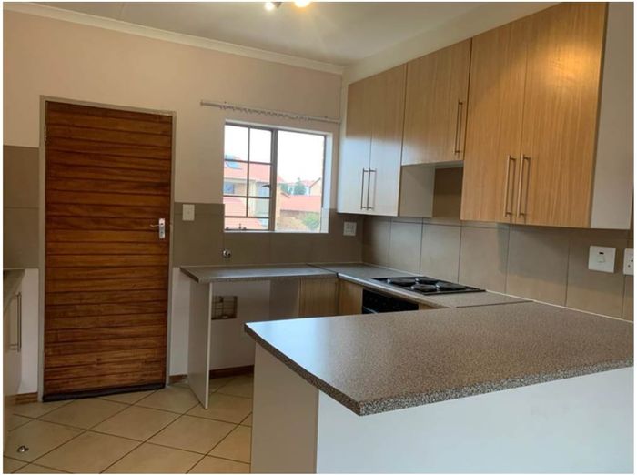 For Sale: Apartment in Monavoni with 2 bedrooms, garage, and play area.