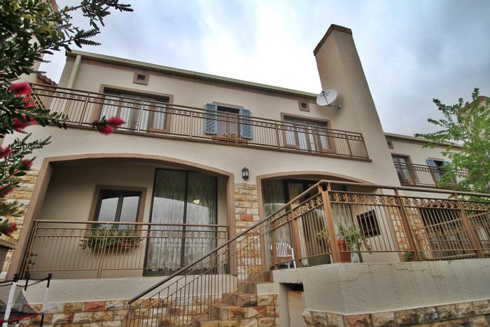 For Sale: Townhouse in Woodland Hills Wildlife Estate with 3 beds, double garage, patio.