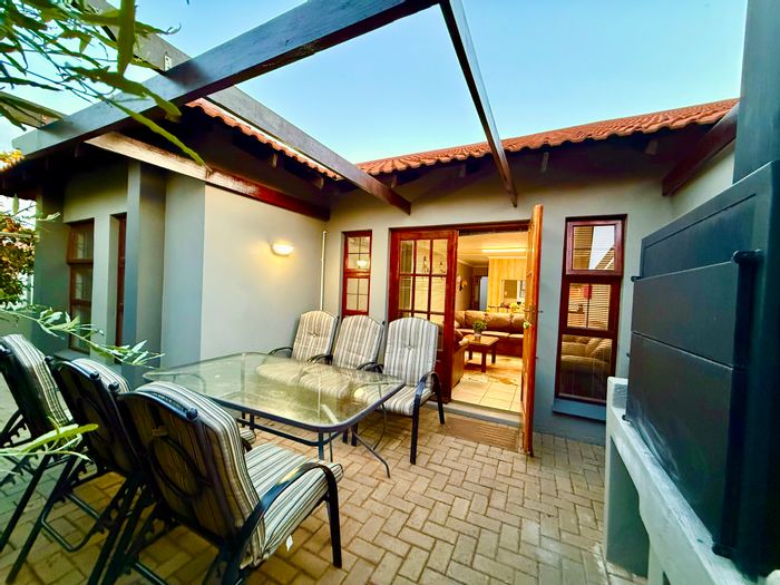 Townhouse for Sale in Woodland Hills Wildlife Estate: 3 beds, private patio, double garages.