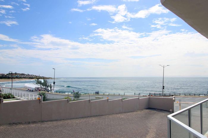 Oceanfront apartment in Margate Central, 2 beds, patio, secure parking, for sale.