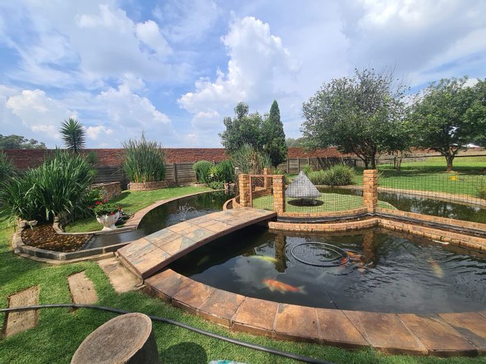 Inglethorpe AH Farm For Sale: Spacious land, stables, workshops, and off-grid amenities.