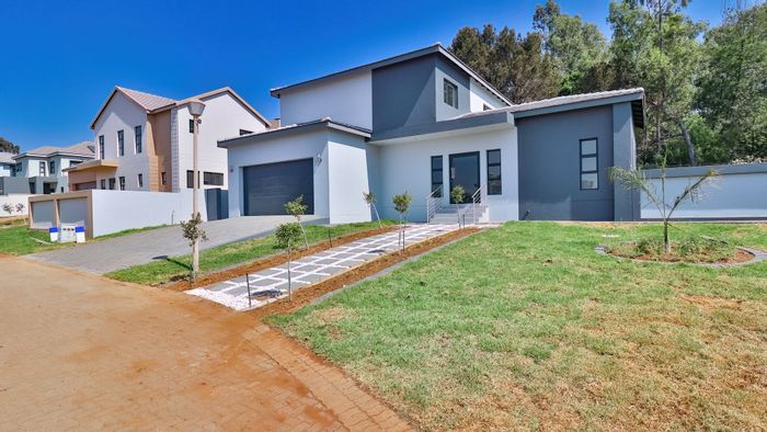 For Sale: Blue Hills House with 4 beds, pool, and dual garages.