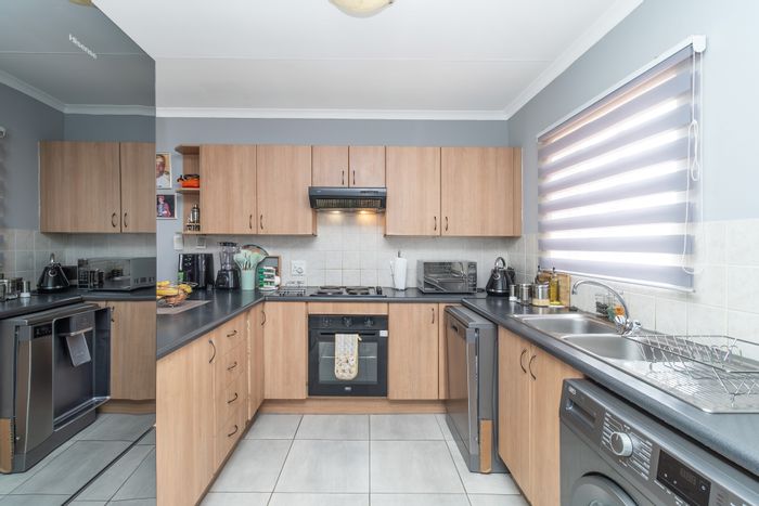 For Sale: Carlswald Townhouse with pool, security, and close to schools.