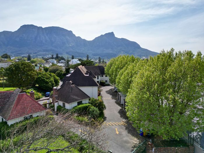 For Sale: Spacious 2-bedroom apartment in Claremont with private stoep and parking.