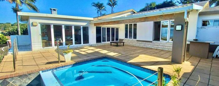 Pumula House For Sale: 4 bedrooms, pool, sea views, and ample garden space.