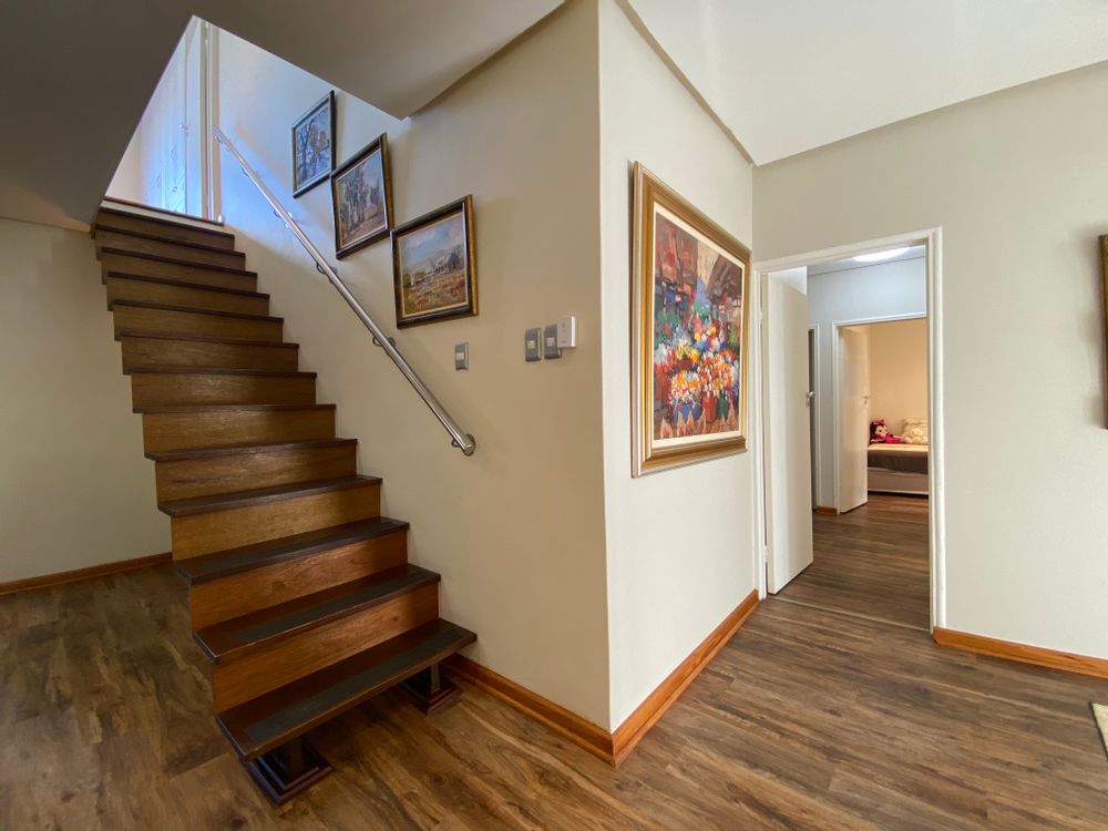 Stairway to master suite. Doorway on right leads to other 3 bedrooms