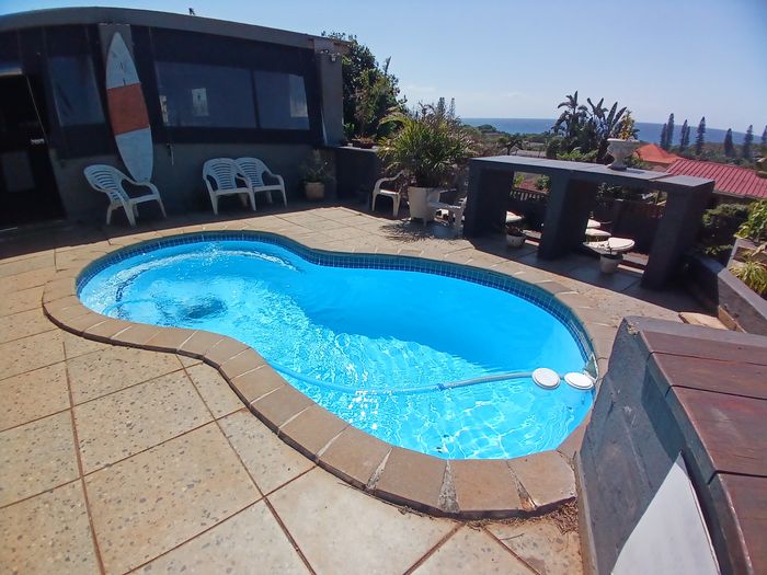 For Sale: House in Sunwich Port with pool, flats, and ocean views.