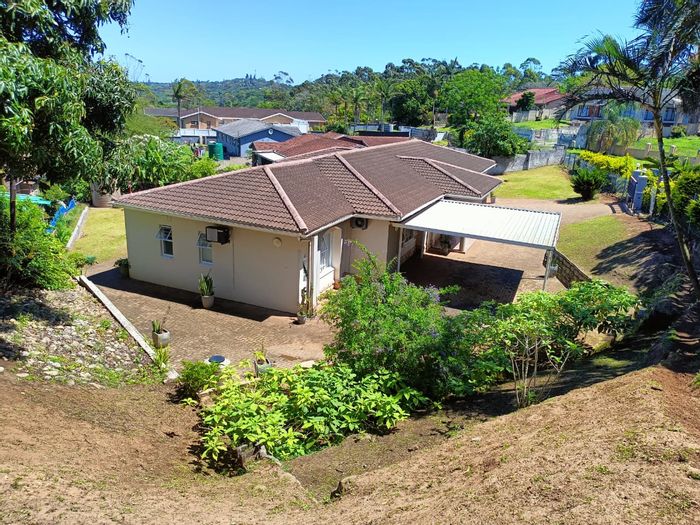 For Sale: Spacious Shelly Beach house with 3 bedrooms, double garage, and water tank.