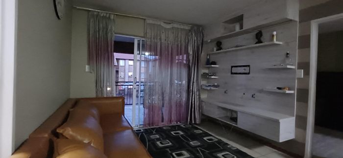 For Sale: Cluster in Noordwyk with 2 beds, en-suites, balcony, and amenities.