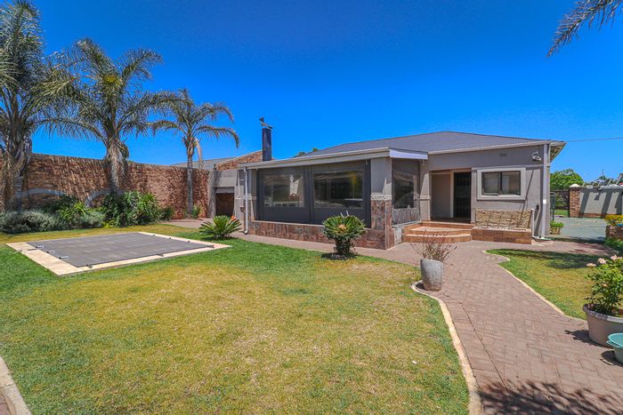 For Sale in Casseldale: 4-Bedroom House with Pool, Patios, and Entertainment Area.