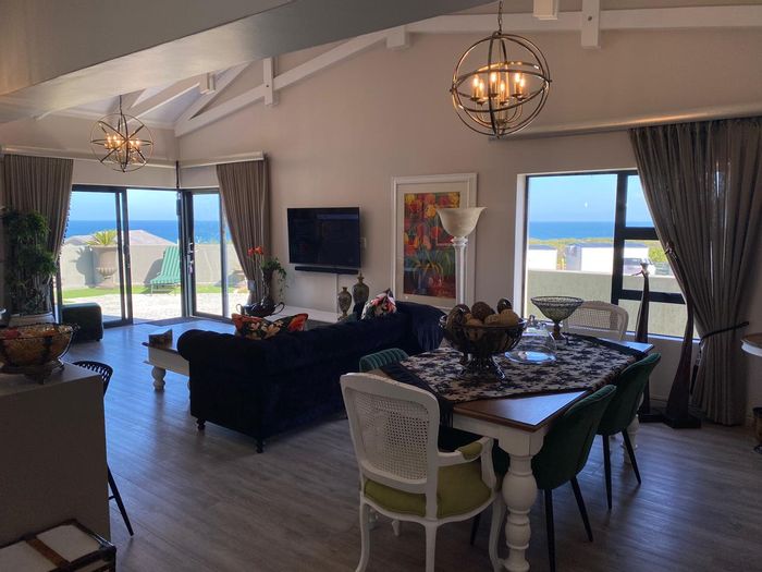 Coastal 2-bedroom house in Tergniet with ocean views and secure estate living. For Sale.