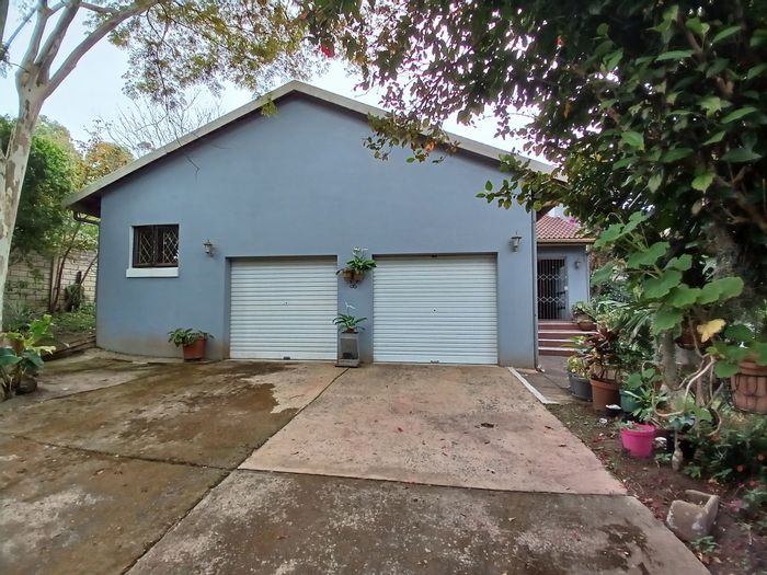 For Sale: House in Leisure Bay with garden, patio, solar power, and double garage.