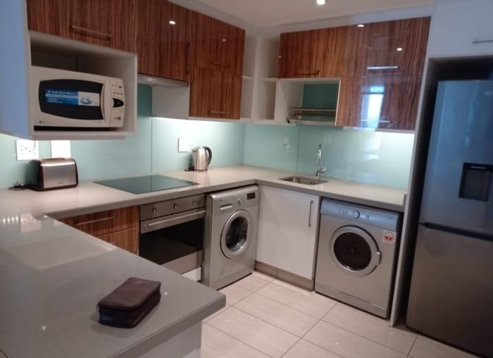 For Sale: 3-Bedroom Apartment in Umhlanga Central with Furnished Interiors and Parking.