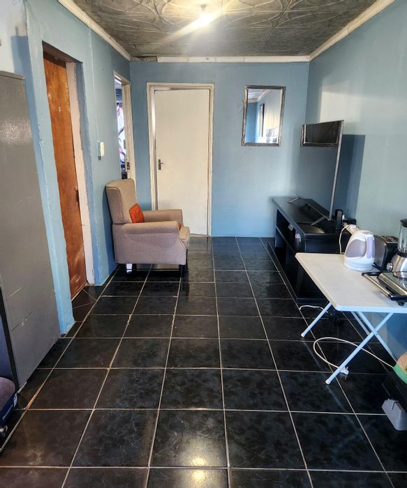 Two-bedroom house in Mfuleni with secure parking and close to amenities. For Sale.