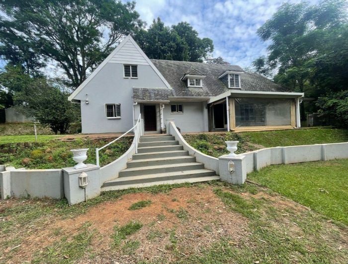 For Sale: Spacious Town Hill house with 4 bedrooms, large yard, and outbuilding.