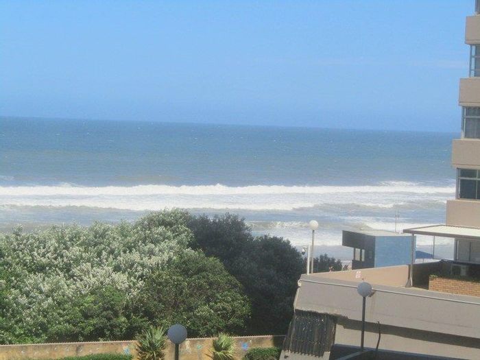 Doonside Apartment For Sale: Beachfront living, 2 bedrooms, pool, secure parking.
