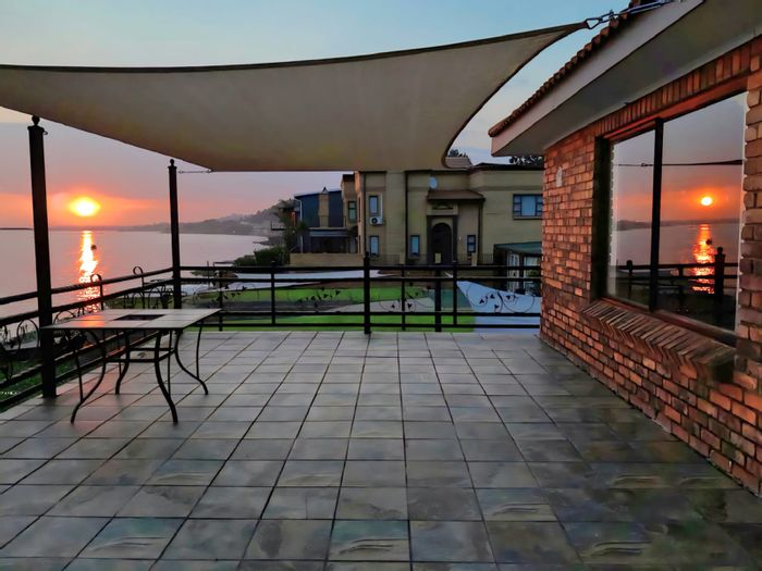 House For Sale in Kungwini Country Estate: Water access, private jetty, and outdoor living.