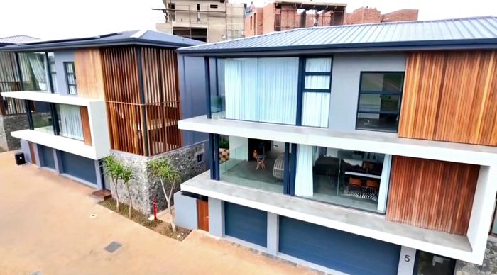 For Sale: Cluster at Zimbali Lakes Resort with pool, garden, and security features.