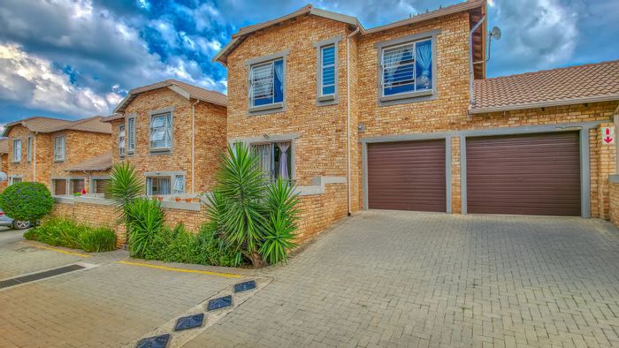 For Sale: Townhouse in Wilgeheuwel with private garden, double garage, and excellent security.