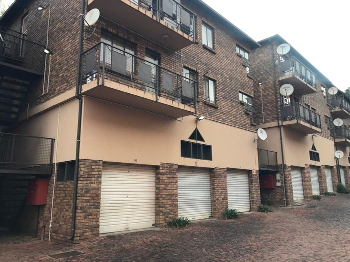 For Sale: Flat in Gezina with 2 bedrooms, garage, garden, and secure living.