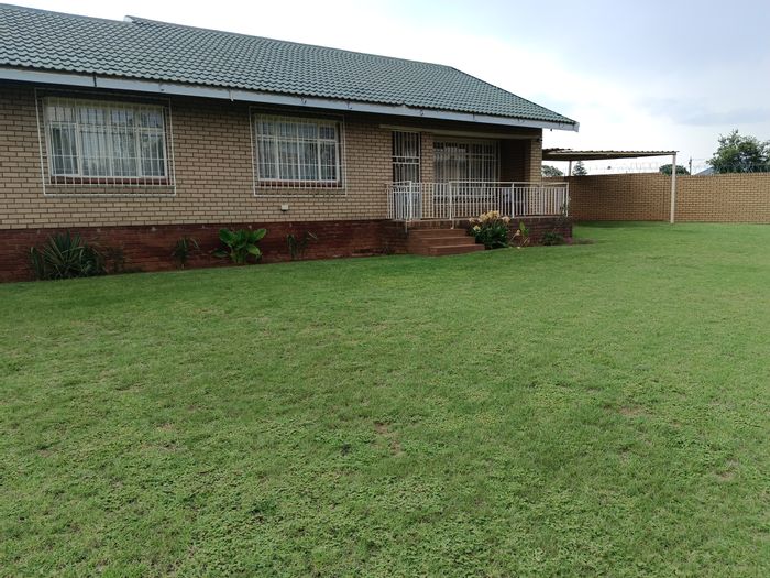 For Sale: House in Kriel Central with flat, spacious yard, and security features.
