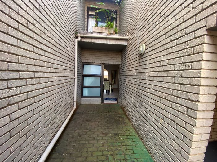 Pet-friendly Margate Beach townhouse for sale with direct beach access and ocean views.