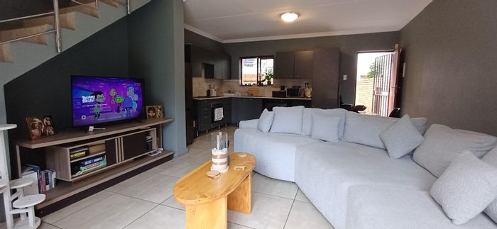 For Sale: Townhouse in Blue Hills with private garden, parking, and open-plan living.