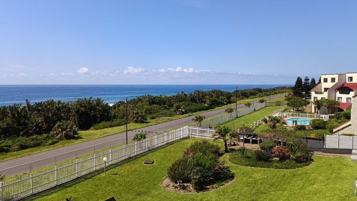 2-Bedroom Apartment for Sale in Uvongo Beach with Sea Views and Amenities.