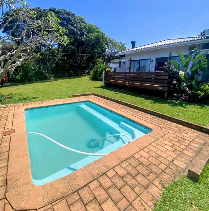 For Sale: Unique Trafalgar house with four cottages, pool, and extensive security features.