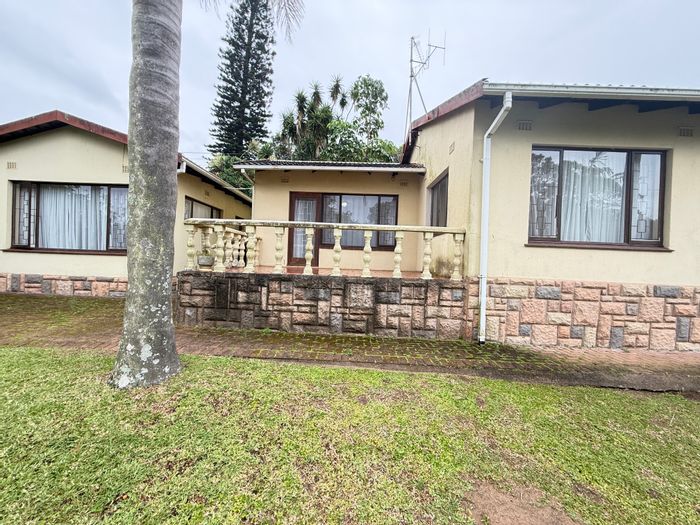 For Sale: House in Margate Central with flatlet, double garage, and garden.