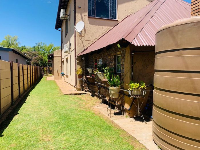 4-Bedroom House For Sale in Middelburg Central with Garden, Garage, and Solar.